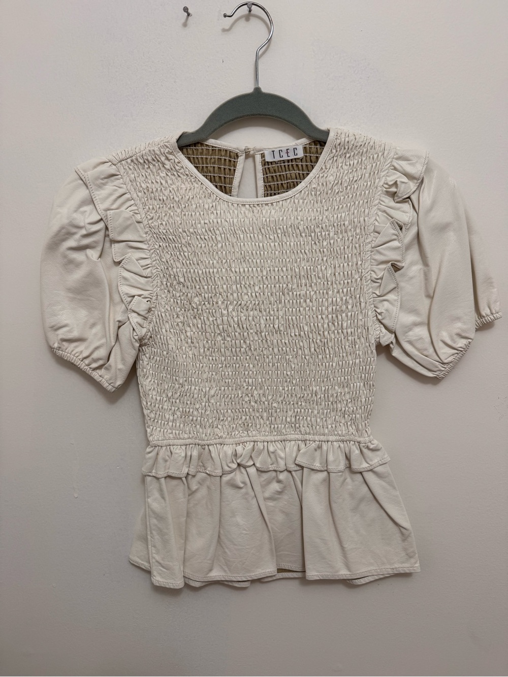 TCEC Ivory Smocked Peplum Puff Sleeve Top